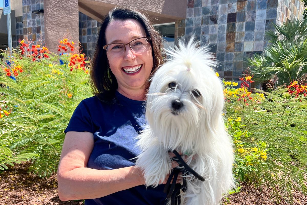 Karen holding dog