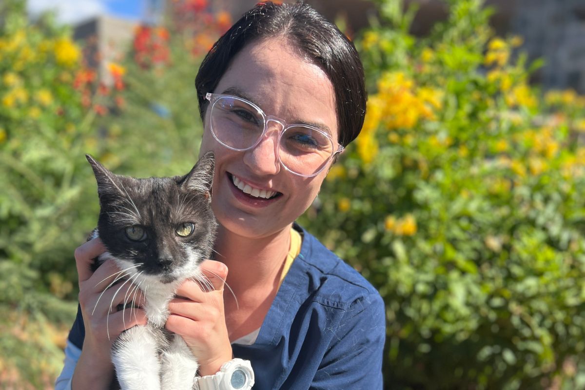 Kayla holding cat